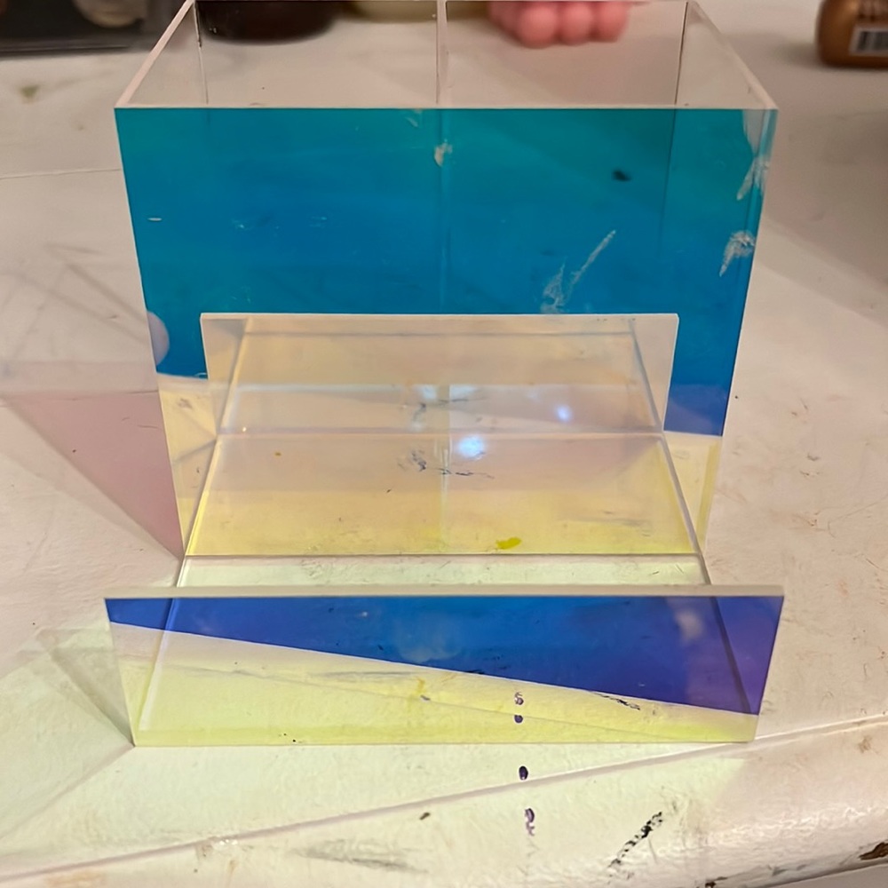 TWO makeup container holders